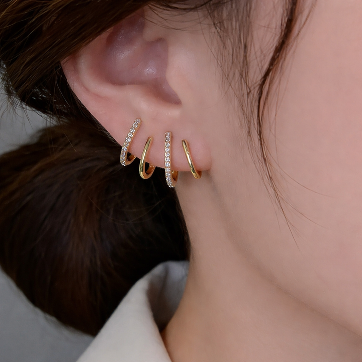 Evarune - Boucles d’Oreilles Femme Design Spirale Zirconiums Élégance Moderne