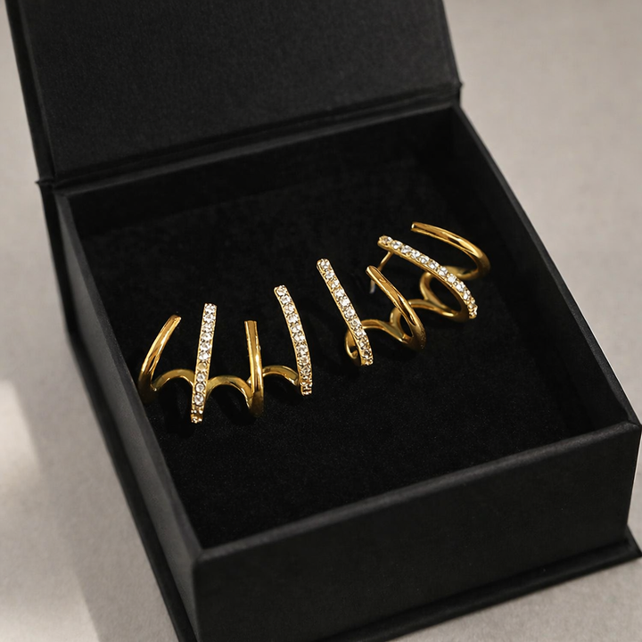Evarune - Boucles d’Oreilles Femme Design Spirale Zirconiums Élégance Moderne