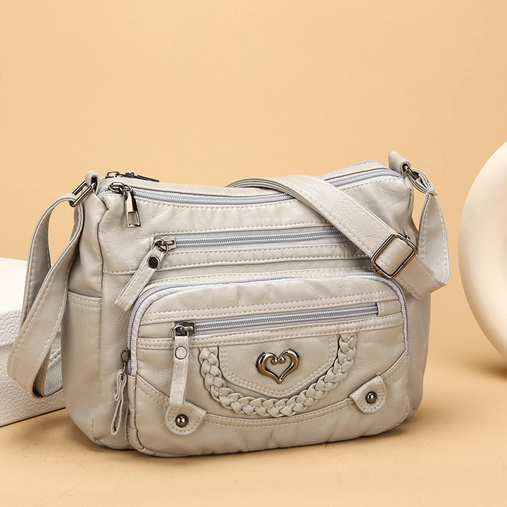 Quixelle - Sac bandoulière femme en cuir PU souple avec multiples poches